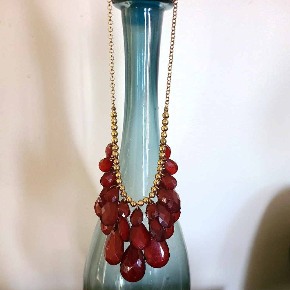 Ruby red colored jewels statement necklace